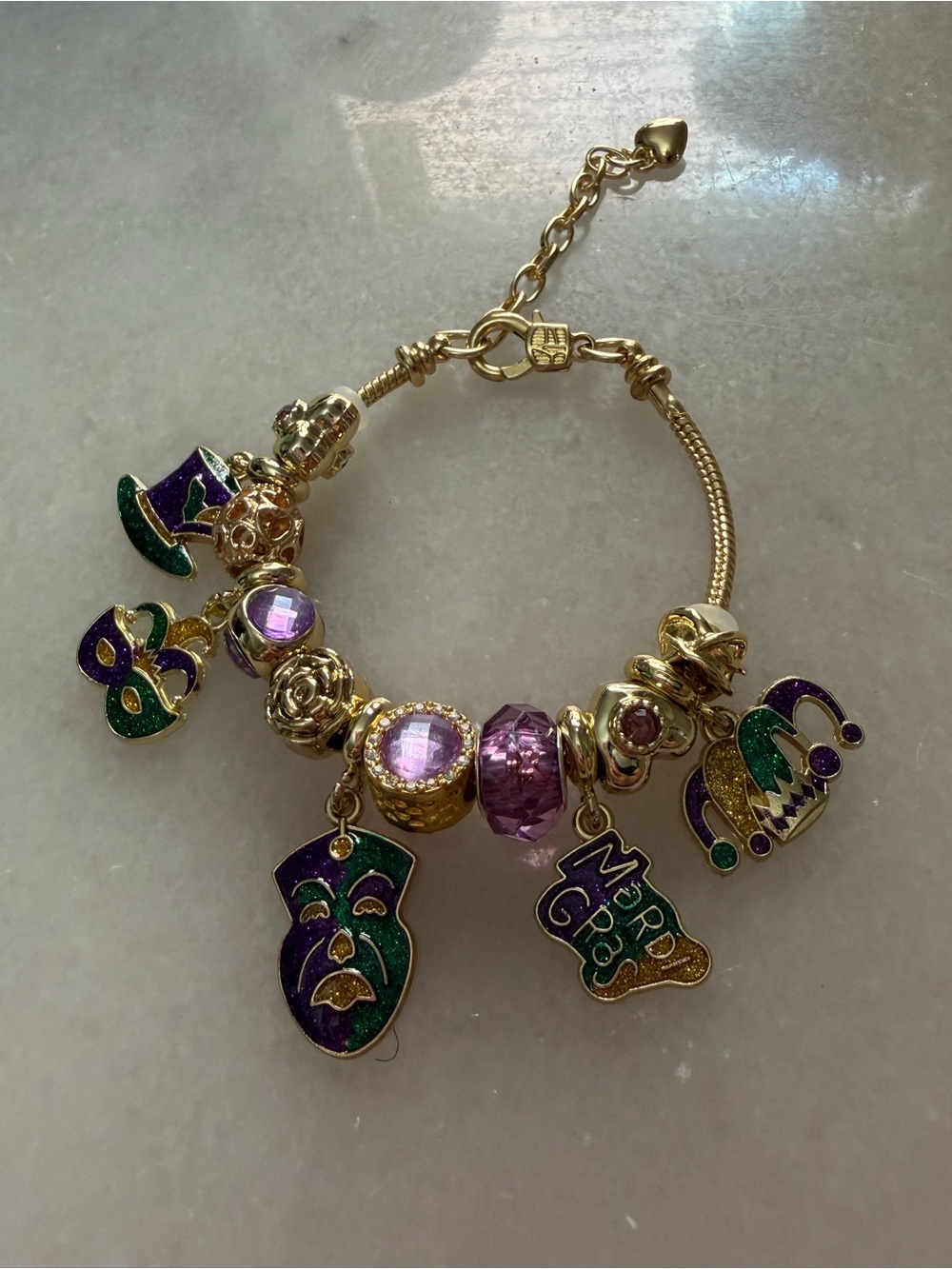 Gold-toned Mardi Gras Charm Bracelet with Purple & Green Accents